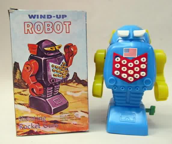 PALE BLUE WALK ROBOT PLASTIC SPACE WIND UP TOY made in Hong Kong it does work 